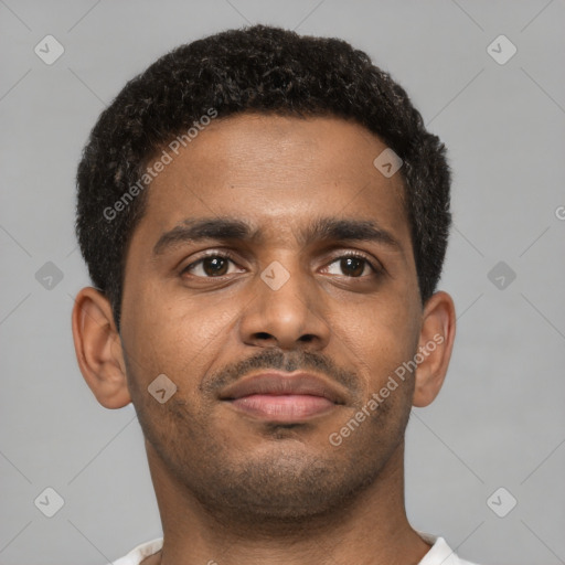 Neutral black young-adult male with short  brown hair and brown eyes