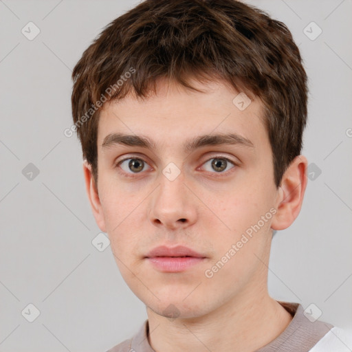 Neutral white young-adult male with short  brown hair and grey eyes