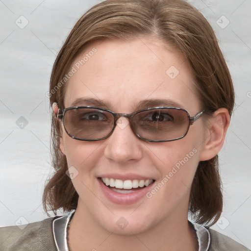 Joyful white young-adult female with medium  brown hair and blue eyes