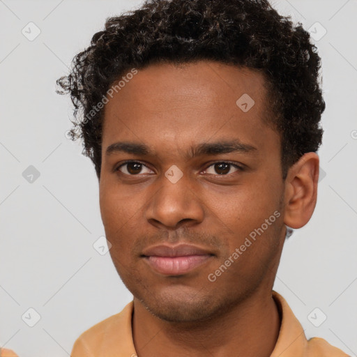 Neutral black young-adult male with short  brown hair and brown eyes