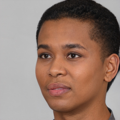 Neutral black young-adult female with short  black hair and brown eyes