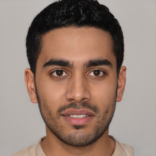 Neutral latino young-adult male with short  black hair and brown eyes