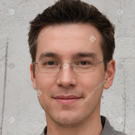 Joyful white adult male with short  brown hair and grey eyes