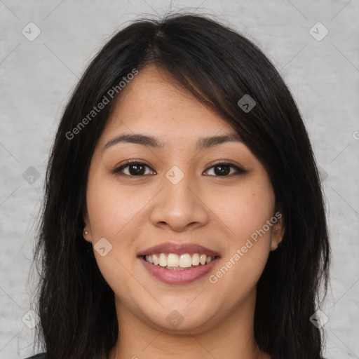 Joyful latino young-adult female with long  brown hair and brown eyes