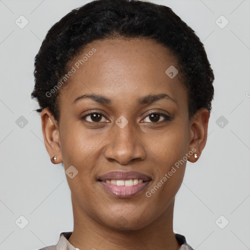 Joyful black young-adult female with short  brown hair and brown eyes