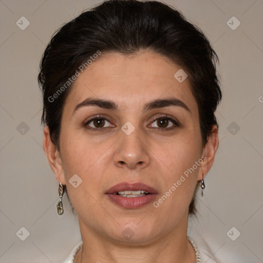 Joyful white adult female with short  brown hair and brown eyes