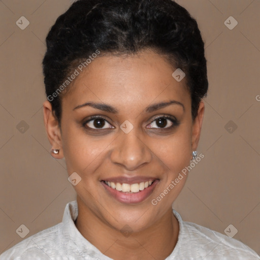 Joyful black young-adult female with short  brown hair and brown eyes