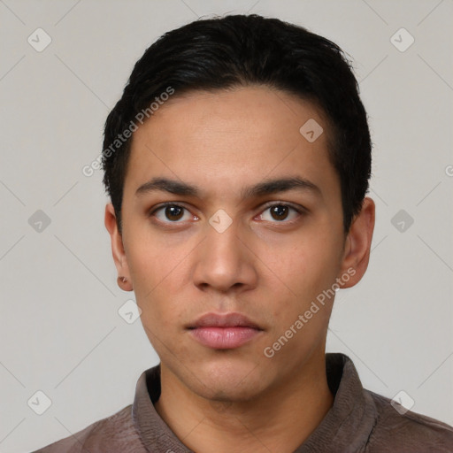 Neutral latino young-adult male with short  black hair and brown eyes