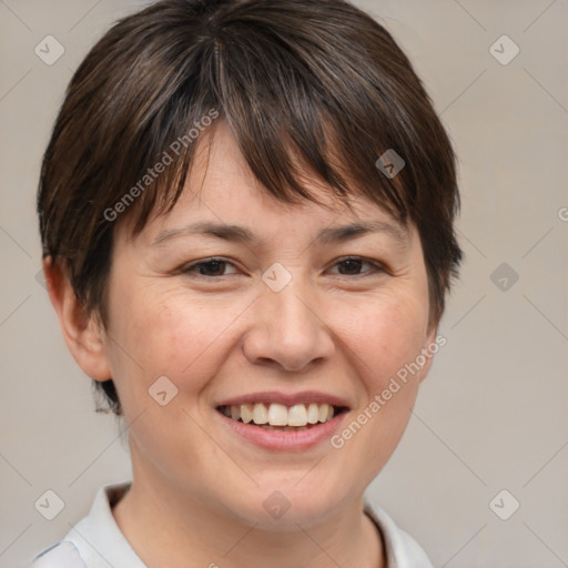 Joyful white adult female with medium  brown hair and brown eyes