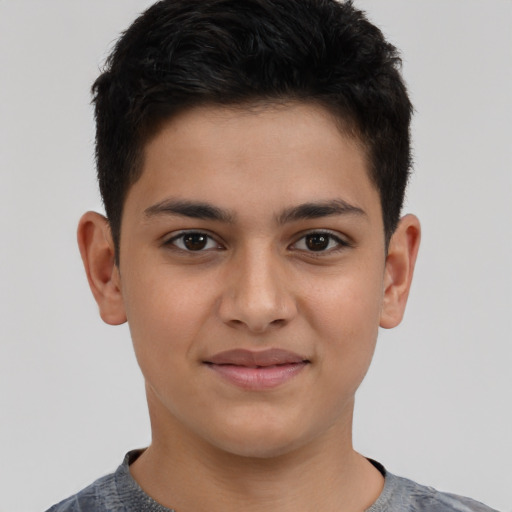 Joyful latino young-adult male with short  brown hair and brown eyes