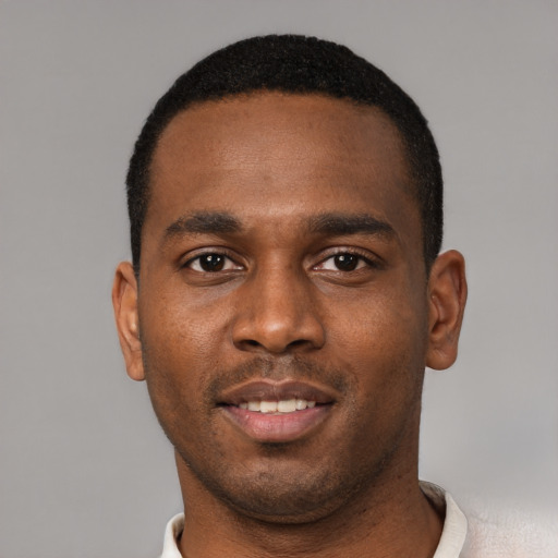 Neutral black young-adult male with short  black hair and brown eyes