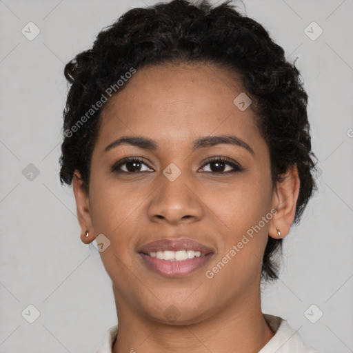 Joyful latino young-adult female with short  black hair and brown eyes