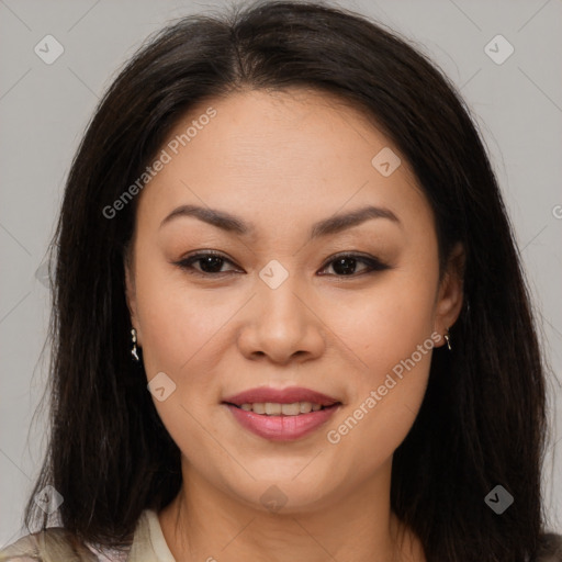 Joyful latino young-adult female with long  brown hair and brown eyes