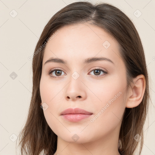 Neutral white young-adult female with long  brown hair and brown eyes