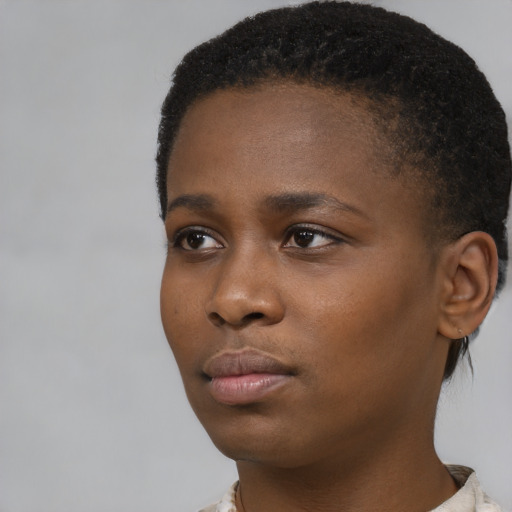 Neutral black young-adult female with short  black hair and brown eyes