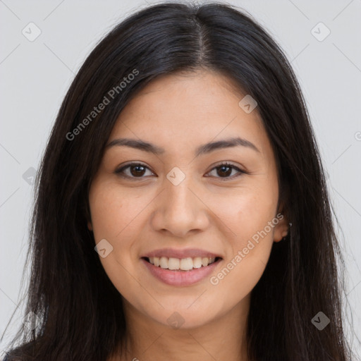 Joyful latino young-adult female with long  brown hair and brown eyes