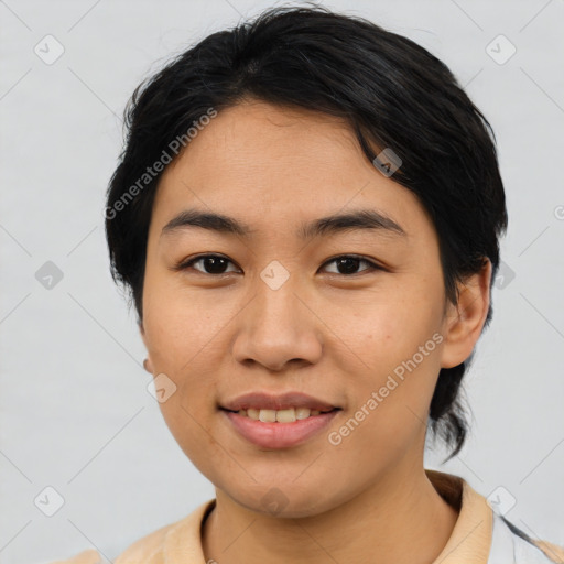 Joyful asian young-adult female with medium  black hair and brown eyes