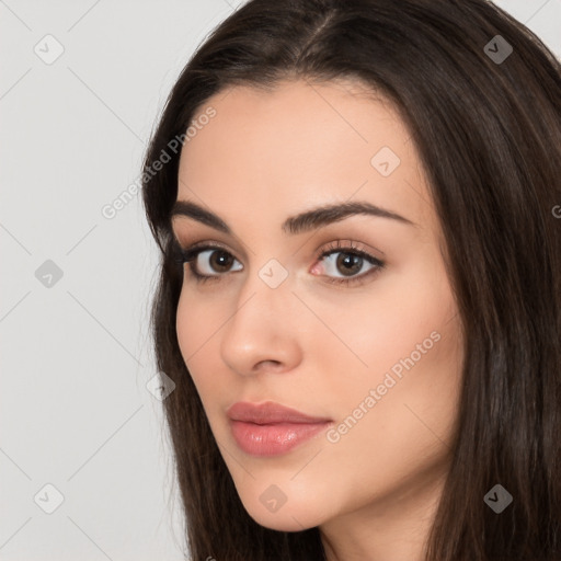 Neutral white young-adult female with long  brown hair and brown eyes