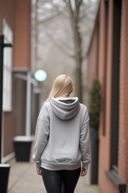 Dutch young adult female with  blonde hair