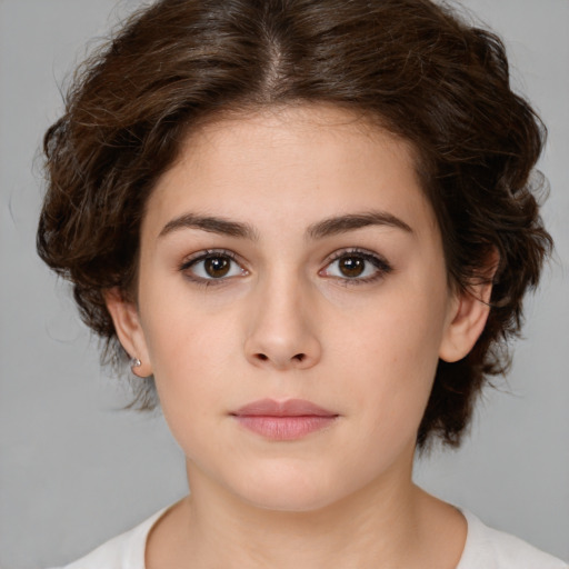 Neutral white young-adult female with medium  brown hair and brown eyes