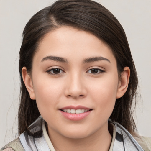 Joyful white young-adult female with medium  brown hair and brown eyes