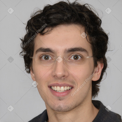 Joyful white young-adult male with medium  brown hair and brown eyes