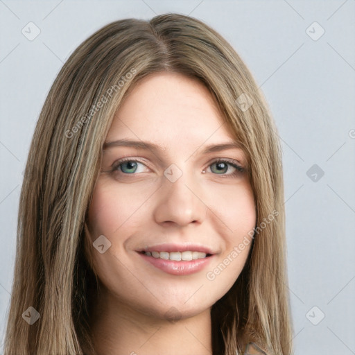 Joyful white young-adult female with long  brown hair and green eyes