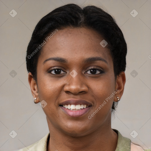 Joyful black young-adult female with short  brown hair and brown eyes