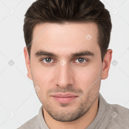 Neutral white young-adult male with short  brown hair and brown eyes