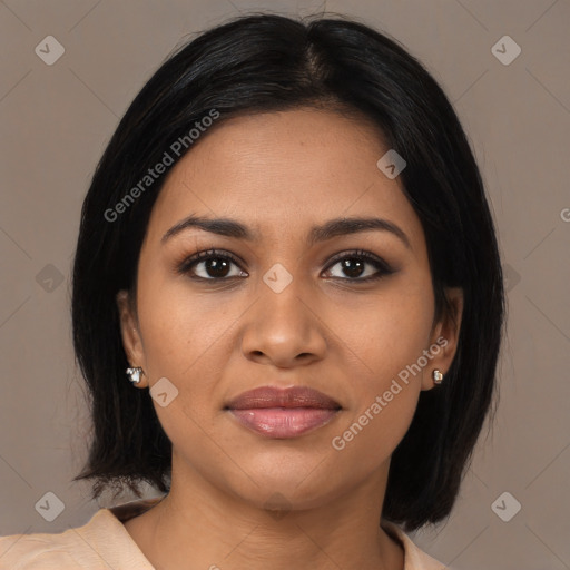 Joyful black young-adult female with medium  black hair and brown eyes