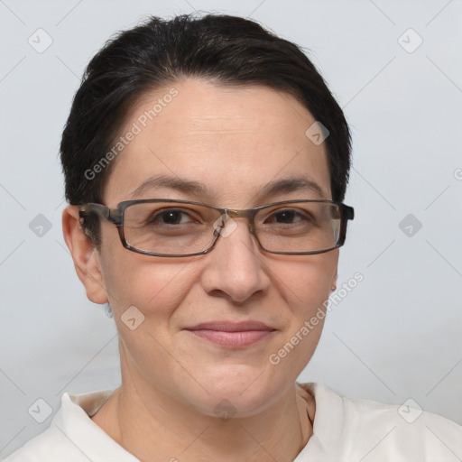 Joyful white adult female with short  brown hair and brown eyes