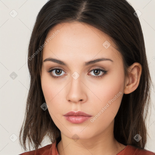 Neutral white young-adult female with long  brown hair and brown eyes