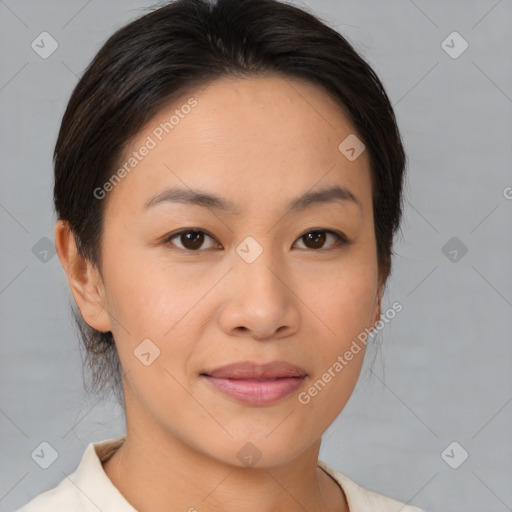 Joyful asian young-adult female with medium  brown hair and brown eyes