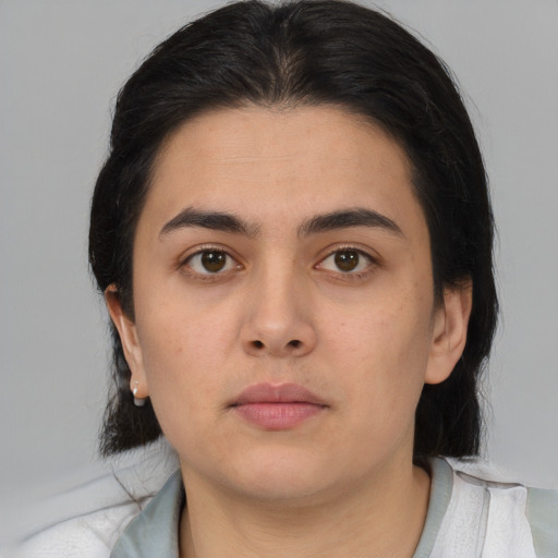 Neutral asian young-adult female with medium  brown hair and brown eyes