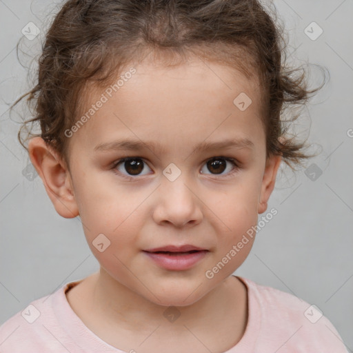 Joyful white child female with short  brown hair and brown eyes