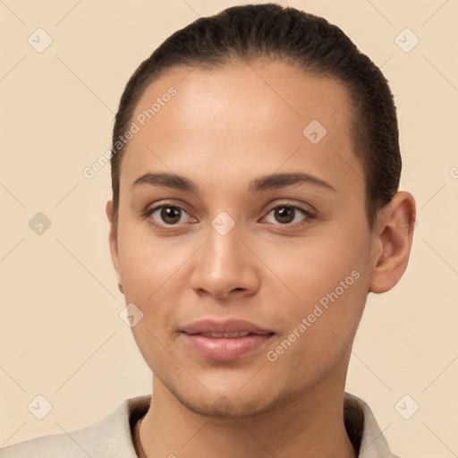 Joyful white young-adult female with short  brown hair and brown eyes