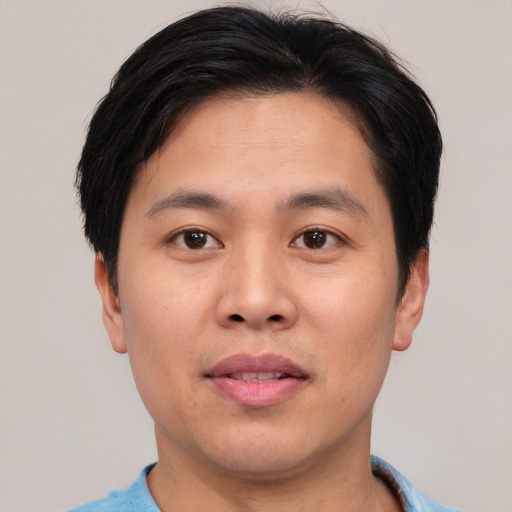 Neutral asian young-adult male with short  brown hair and brown eyes