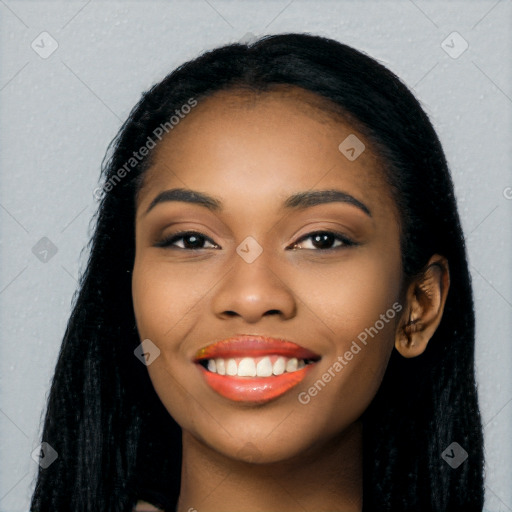 Joyful latino young-adult female with long  black hair and brown eyes