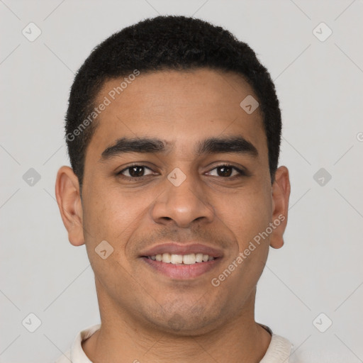 Joyful latino young-adult male with short  black hair and brown eyes