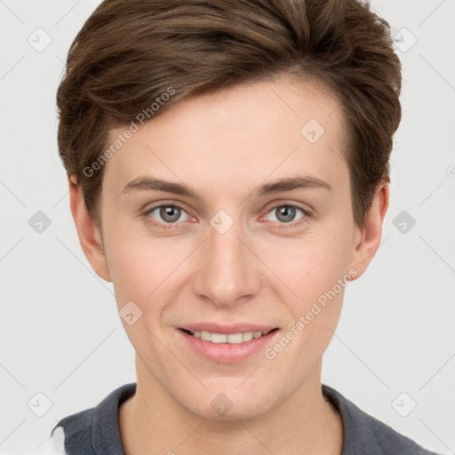 Joyful white young-adult female with short  brown hair and grey eyes