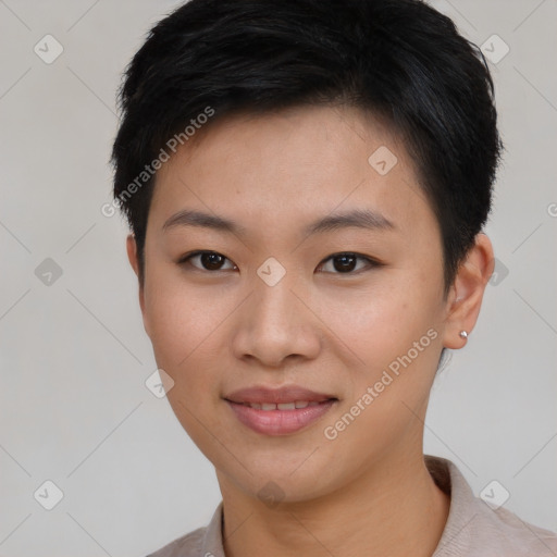 Joyful asian young-adult female with short  black hair and brown eyes