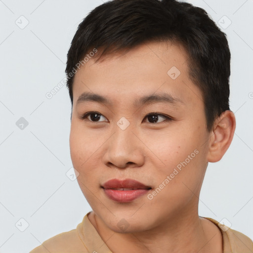 Joyful asian young-adult male with short  brown hair and brown eyes