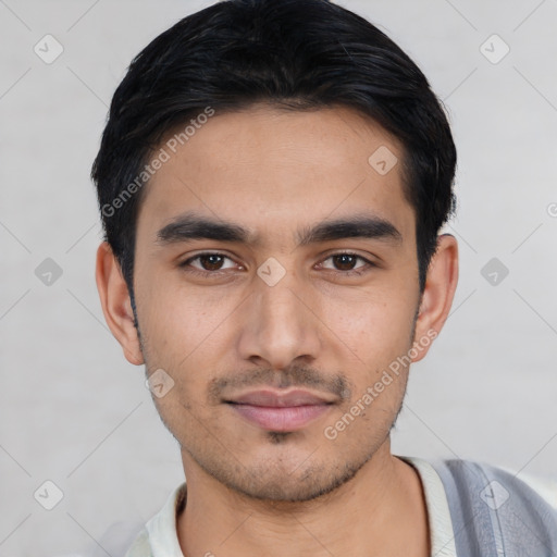 Joyful asian young-adult male with short  black hair and brown eyes
