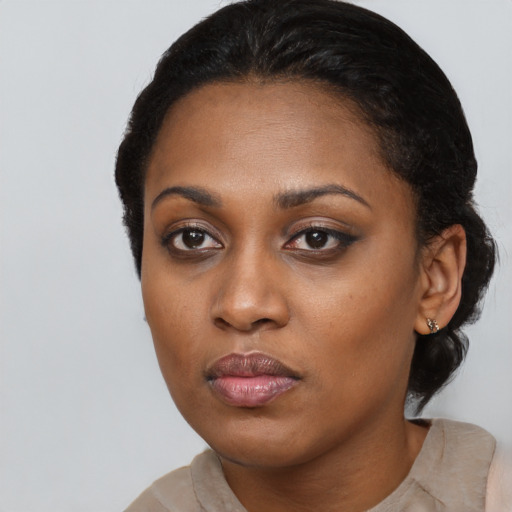 Neutral black young-adult female with short  black hair and brown eyes