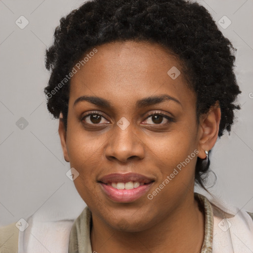 Joyful black young-adult female with short  brown hair and brown eyes