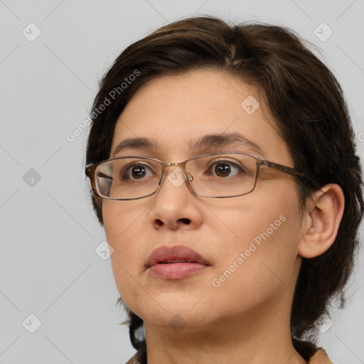 Neutral white young-adult female with medium  brown hair and brown eyes