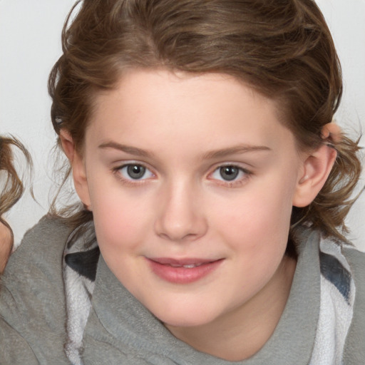 Joyful white child female with medium  brown hair and blue eyes