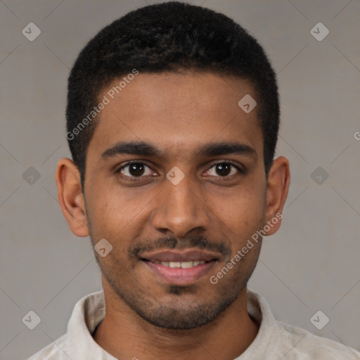 Joyful black young-adult male with short  brown hair and brown eyes