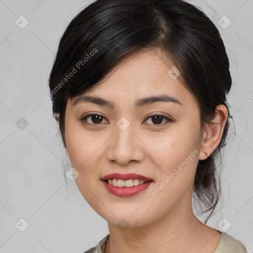 Joyful asian young-adult female with medium  brown hair and brown eyes