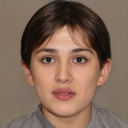 Neutral white young-adult female with short  brown hair and brown eyes